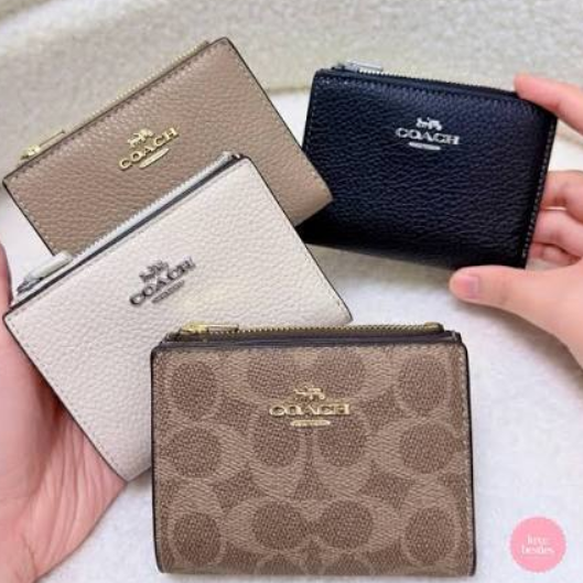 Coach Outlet：卡包送礼专场！花卉印花拉链手拿包$38